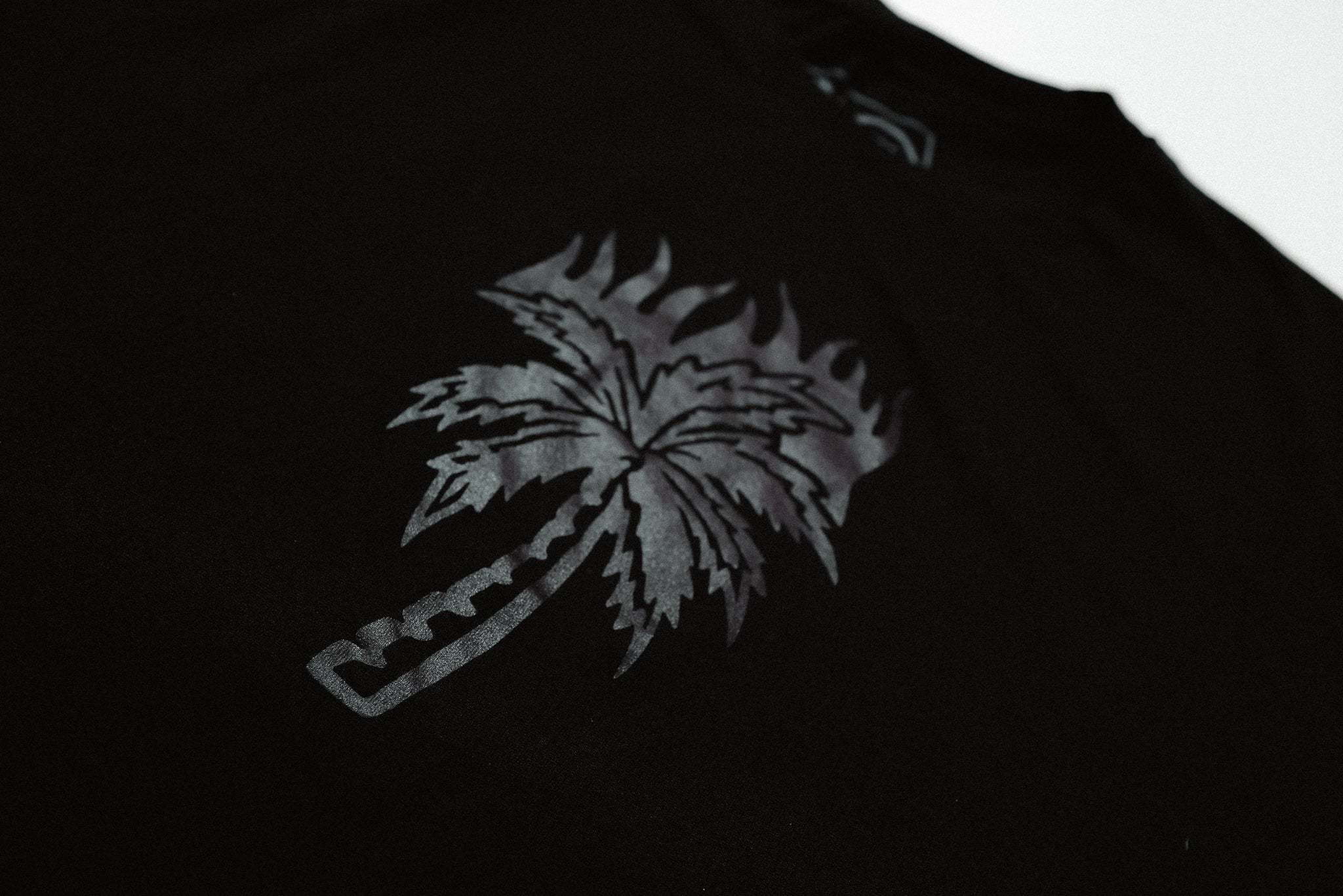PALMS ON FIRE (BLACK ON BLACK)